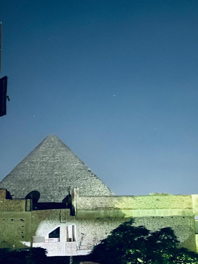 Momen Pyramids Inn Kafrat al Jabal Bagian luar foto
